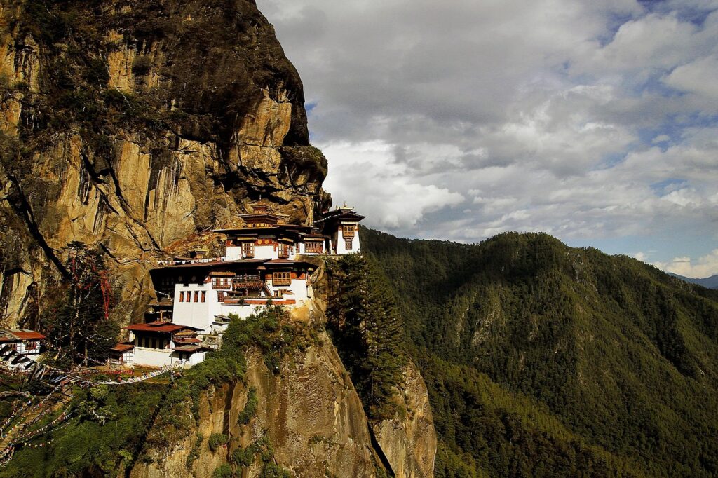 temple, monastery, cliff, cliffside, mountainside, mountains, mountain range, countryside, buddhist temple, tigers nest, taktsang palphug monastery, nature, paro taktsang, bhutan